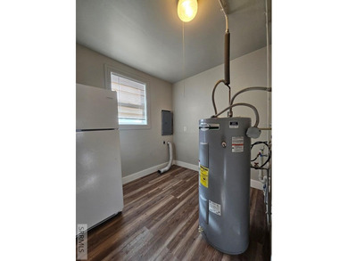 Charming and affordable 3-bedroom, 1-bath home tucked just off on  in  - for sale on GolfHomes.com, golf home, golf lot