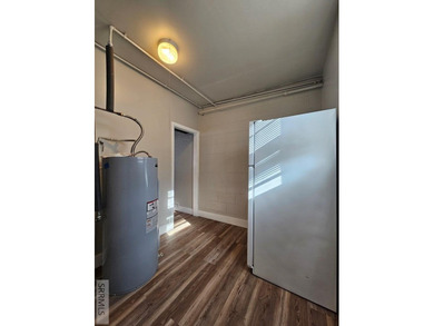 Charming and affordable 3-bedroom, 1-bath home tucked just off on  in  - for sale on GolfHomes.com, golf home, golf lot