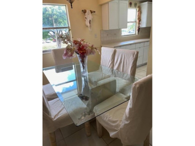 Welcome home to this move in ready 2nd floor corner in the on Kings Point Golf - Executive in Florida - for sale on GolfHomes.com, golf home, golf lot