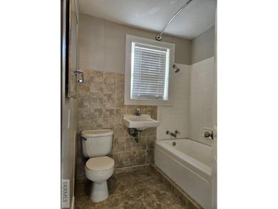 Charming and affordable 3-bedroom, 1-bath home tucked just off on  in  - for sale on GolfHomes.com, golf home, golf lot