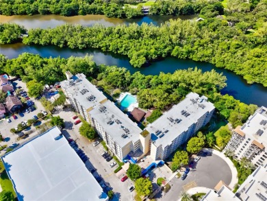 This exceptional corner unit comes with 2 cover parking spaces on Greynolds Park Golf Course in Florida - for sale on GolfHomes.com, golf home, golf lot