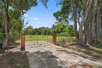 Just reduced by $100,000 and seller wants offers ASAP on Killian Greens Golf Club in Florida - for sale on GolfHomes.com, golf home, golf lot