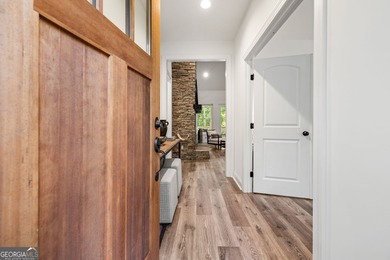 Nestled in the gated community of The Orchard Golf & Country on The Orchard Golf and Country Club in Georgia - for sale on GolfHomes.com, golf home, golf lot