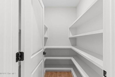 Beautiful black and white farmhouse home located across from the on  in North Carolina - for sale on GolfHomes.com, golf home, golf lot