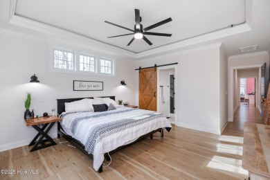 Welcome to this stunning & charming farmhouse-style home on River Golf and County Club at Lake Royale in North Carolina - for sale on GolfHomes.com, golf home, golf lot