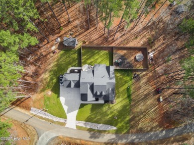 Welcome to this stunning & charming farmhouse-style home on River Golf and County Club at Lake Royale in North Carolina - for sale on GolfHomes.com, golf home, golf lot