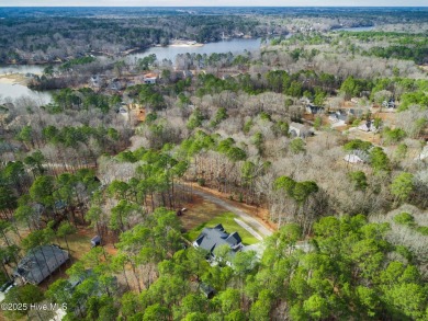 Welcome to this stunning & charming farmhouse-style home on River Golf and County Club at Lake Royale in North Carolina - for sale on GolfHomes.com, golf home, golf lot