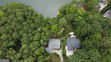 This 3 bed, 2 bath single-story home sits on the smaller fishing on Fairfield Plantation Golf and Country Club in Georgia - for sale on GolfHomes.com, golf home, golf lot