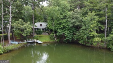 This 3 bed, 2 bath single-story home sits on the smaller fishing on Fairfield Plantation Golf and Country Club in Georgia - for sale on GolfHomes.com, golf home, golf lot