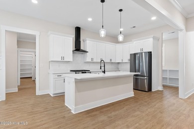 Beautiful new construction home located across from the waterway on Oyster Bay Golf Links in North Carolina - for sale on GolfHomes.com, golf home, golf lot