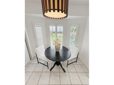 This beautifully renovated single family home features an open on Capri Isle Golf Club in Florida - for sale on GolfHomes.com, golf home, golf lot