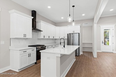 Beautiful new construction home located across from the waterway on Oyster Bay Golf Links in North Carolina - for sale on GolfHomes.com, golf home, golf lot