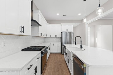 Beautiful new construction home located across from the waterway on Oyster Bay Golf Links in North Carolina - for sale on GolfHomes.com, golf home, golf lot