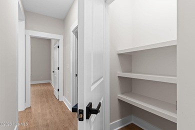 Beautiful new construction home located across from the waterway on Oyster Bay Golf Links in North Carolina - for sale on GolfHomes.com, golf home, golf lot