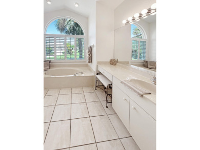 This beautifully renovated single family home features an open on Capri Isle Golf Club in Florida - for sale on GolfHomes.com, golf home, golf lot
