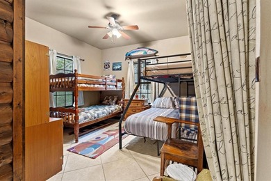 RUSTIC CABIN ON LAKE TEXOMA! HUGE SHOP BUILDING! WALK TO THE on Tanglewood Resort in Texas - for sale on GolfHomes.com, golf home, golf lot