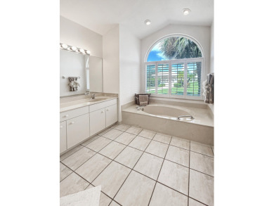 This beautifully renovated single family home features an open on Capri Isle Golf Club in Florida - for sale on GolfHomes.com, golf home, golf lot