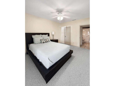 This beautifully renovated single family home features an open on Capri Isle Golf Club in Florida - for sale on GolfHomes.com, golf home, golf lot