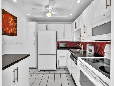 Discover this beautifully updated 2-bedroom, 2-bathroom condo on Turnberry Isle Resort and Club in Florida - for sale on GolfHomes.com, golf home, golf lot