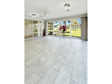 This beautifully renovated single family home features an open on Capri Isle Golf Club in Florida - for sale on GolfHomes.com, golf home, golf lot