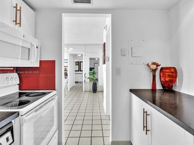 Discover this beautifully updated 2-bedroom, 2-bathroom condo on Turnberry Isle Resort and Club in Florida - for sale on GolfHomes.com, golf home, golf lot