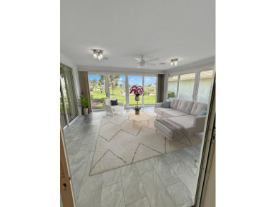 This beautifully renovated single family home features an open on Capri Isle Golf Club in Florida - for sale on GolfHomes.com, golf home, golf lot