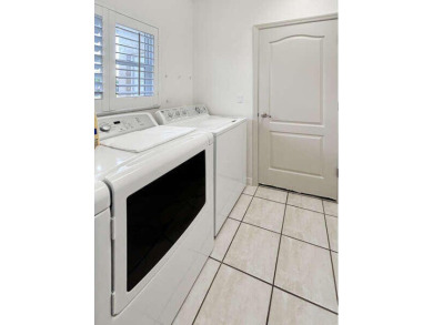 This beautifully renovated single family home features an open on Capri Isle Golf Club in Florida - for sale on GolfHomes.com, golf home, golf lot