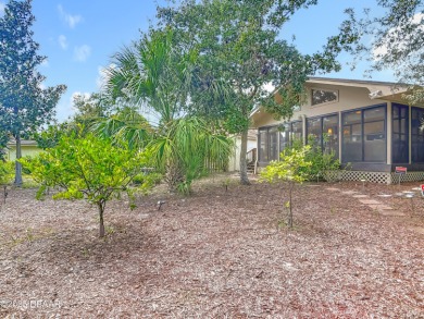 Experience carefree living in this stunning one-level residence on Sugar Mill Country Club in Florida - for sale on GolfHomes.com, golf home, golf lot