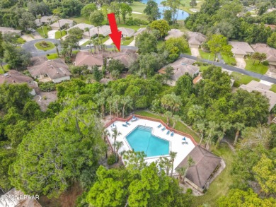 Experience carefree living in this stunning one-level residence on Sugar Mill Country Club in Florida - for sale on GolfHomes.com, golf home, golf lot