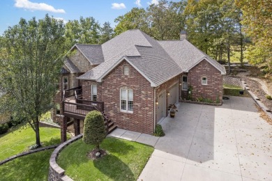 Experience luxury living at its finest in this custom-built on Ledgestone Country Club and Golf Course in Missouri - for sale on GolfHomes.com, golf home, golf lot