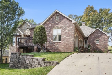 Experience luxury living at its finest in this custom-built on Ledgestone Country Club and Golf Course in Missouri - for sale on GolfHomes.com, golf home, golf lot