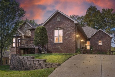 Experience luxury living at its finest in this custom-built on Ledgestone Country Club and Golf Course in Missouri - for sale on GolfHomes.com, golf home, golf lot