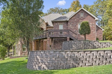 Experience luxury living at its finest in this custom-built on Ledgestone Country Club and Golf Course in Missouri - for sale on GolfHomes.com, golf home, golf lot