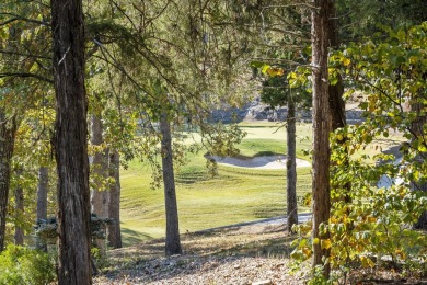 Experience luxury living at its finest in this custom-built on Ledgestone Country Club and Golf Course in Missouri - for sale on GolfHomes.com, golf home, golf lot