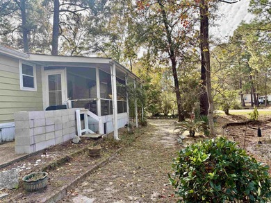 Coastal Living at Its Best! Charming 2 Bed / 2 Bath Beach on Indigo Creek Golf Club in South Carolina - for sale on GolfHomes.com, golf home, golf lot