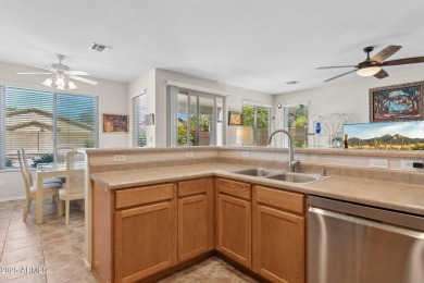 Beautiful single-level home with no interior steps features 3 on The Golf Club At Johnson Ranch in Arizona - for sale on GolfHomes.com, golf home, golf lot