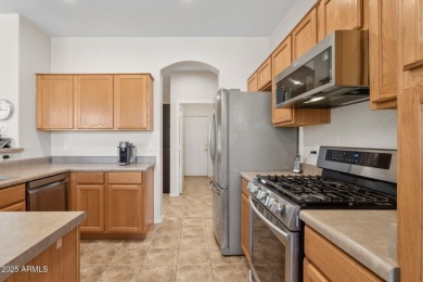 Beautiful single-level home with no interior steps features 3 on The Golf Club At Johnson Ranch in Arizona - for sale on GolfHomes.com, golf home, golf lot