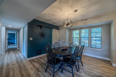 This 3 bedroom, 2 bath condo is sleek, modern & truly move-in on Seasons Ridge At Four Seasons in Missouri - for sale on GolfHomes.com, golf home, golf lot