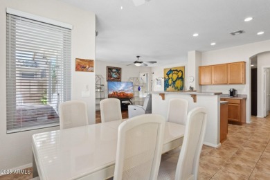 Beautiful single-level home with no interior steps features 3 on The Golf Club At Johnson Ranch in Arizona - for sale on GolfHomes.com, golf home, golf lot