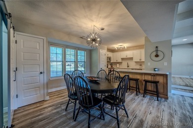 This 3 bedroom, 2 bath condo is sleek, modern & truly move-in on Seasons Ridge At Four Seasons in Missouri - for sale on GolfHomes.com, golf home, golf lot
