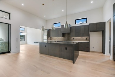 April 2025 buyer incentives include a $20k buyer discretionary on Summit Rock Golf Course in Texas - for sale on GolfHomes.com, golf home, golf lot