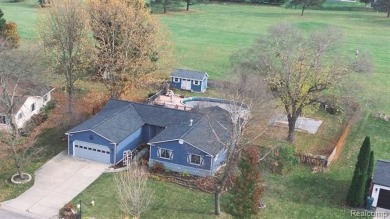 This *Lovely Lapeer* ranch is sure to make you smile! Plenty of on Rolling Hills Golf Club in Michigan - for sale on GolfHomes.com, golf home, golf lot