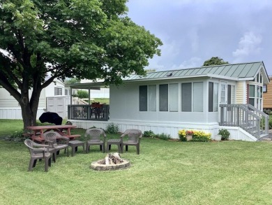 This well-maintained, fully-furnished, 1-bedroom, 1-bathroom on Apple Island Golf Course At Apple Island Resort in Vermont - for sale on GolfHomes.com, golf home, golf lot