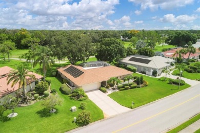 Tranquil, updated, solid-block pool home with distant golf on The Meadows Golf and Country Club in Florida - for sale on GolfHomes.com, golf home, golf lot