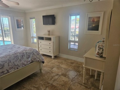 Welcome to your luxury waterfront oasis in Cape Coral! This on Royal Tee Country Club in Florida - for sale on GolfHomes.com, golf home, golf lot