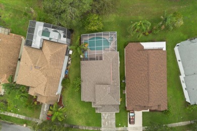 Discover this beautiful 3-bedroom, 2.5-bathroom pool home on Remington Golf Club in Florida - for sale on GolfHomes.com, golf home, golf lot