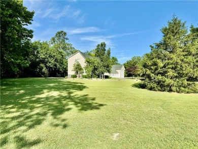 This beautiful home is waiting for you, set on .82 acres backs on Holiday Island Golf Course in Arkansas - for sale on GolfHomes.com, golf home, golf lot