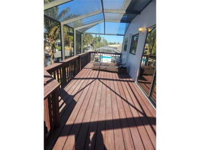 Welcome to your luxury waterfront oasis in Cape Coral! This on Royal Tee Country Club in Florida - for sale on GolfHomes.com, golf home, golf lot