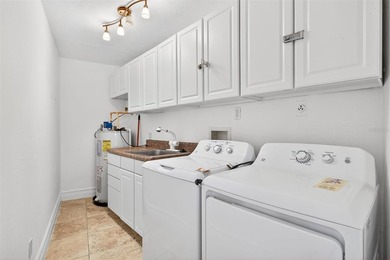 mAJOR RICE REDUCTION! Welcome to your luxury waterfront oasis in on Royal Tee Country Club in Florida - for sale on GolfHomes.com, golf home, golf lot