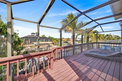 mAJOR RICE REDUCTION! Welcome to your luxury waterfront oasis in on Royal Tee Country Club in Florida - for sale on GolfHomes.com, golf home, golf lot